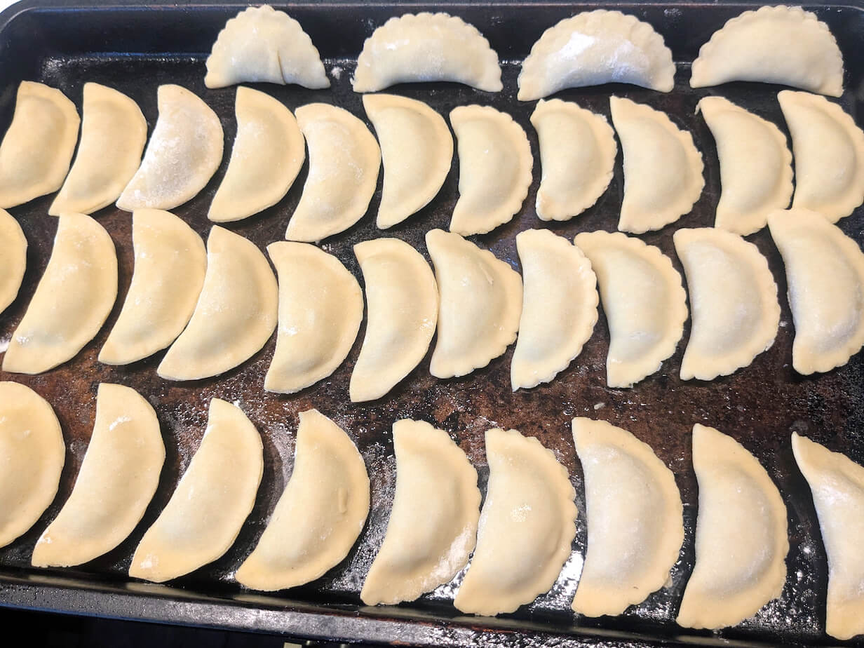 A tray of freshly prepared varenyky.